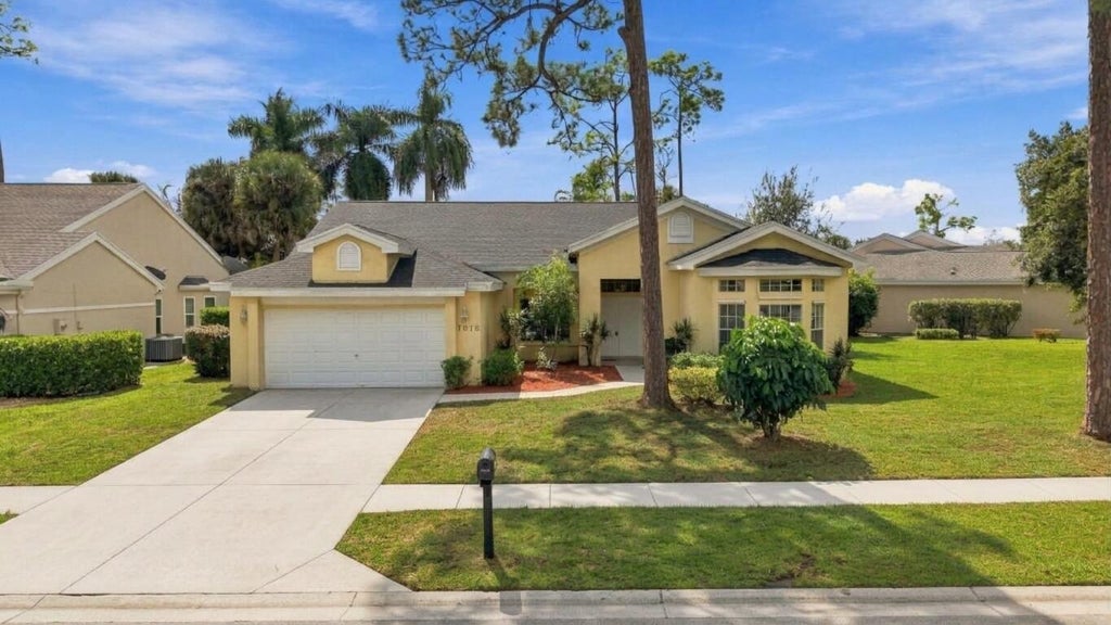 Photo of 1015 LAKE BREEZE Drive, Wellington, FL 33414 (MLS # B26088589)
