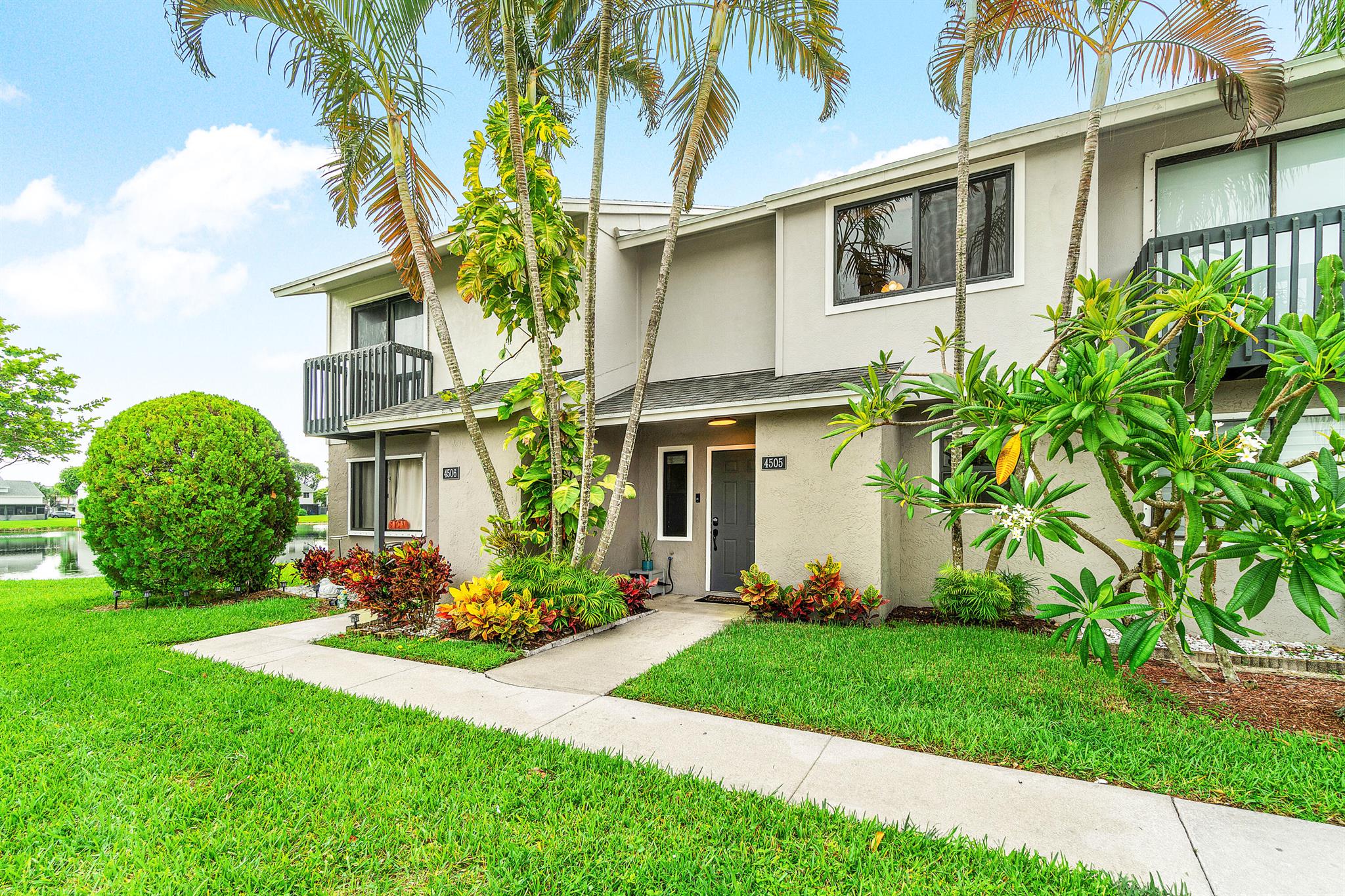 Beautifully updated 2-bed, 2.5-bath townhouse with same vinyl flooring throughout and brand-new 2025 impact windows. Features include new shower glass doors, 2025 kitchen sink/faucet, and two upstairs master suites. Enjoy the fenced patio with 2023 awning and 2024 fence. Systems and appliances are well maintained: dryer 2024, washer 2018, water heater 2021, AC 2018, kitchen appliances 2018. Roof and exterior paint done in 2022. HOA covers building maintenance and amenities. Investor friendly - rent right away. Peaceful community with easy access to Lake Worth Rd, Jog Rd, and the Turnpike.