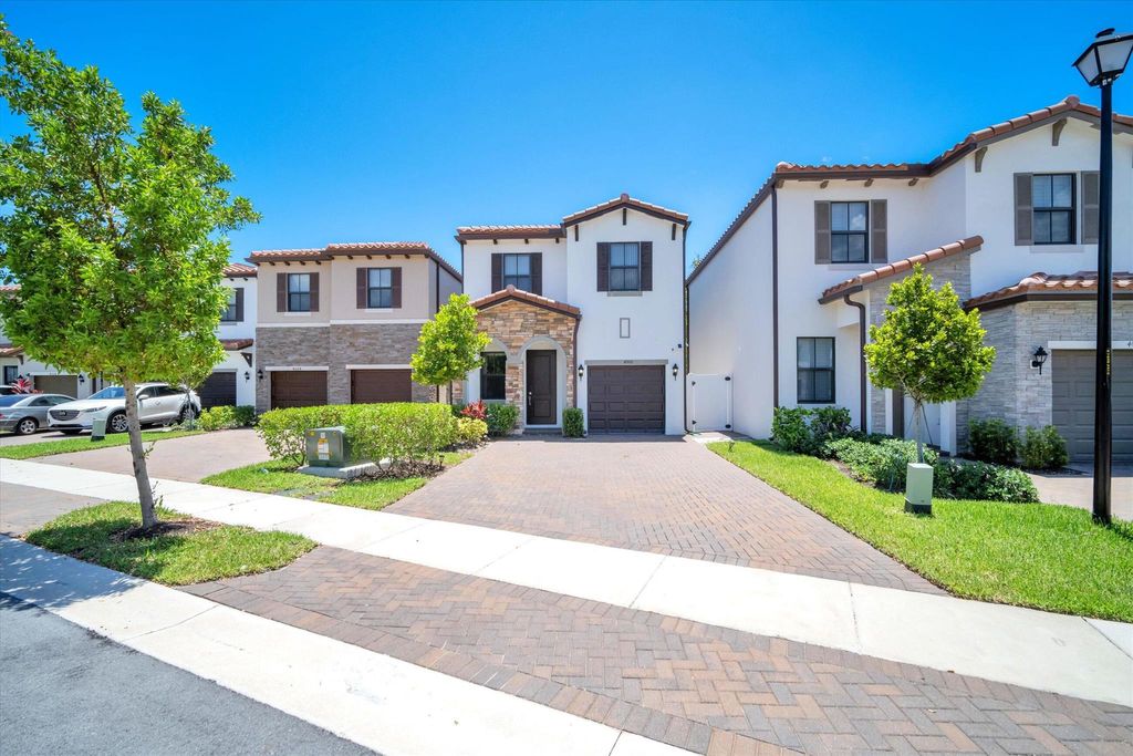 Photo of 4002 Sequoia Place W, Riviera Beach, FL 33410 (MLS # R10930440)