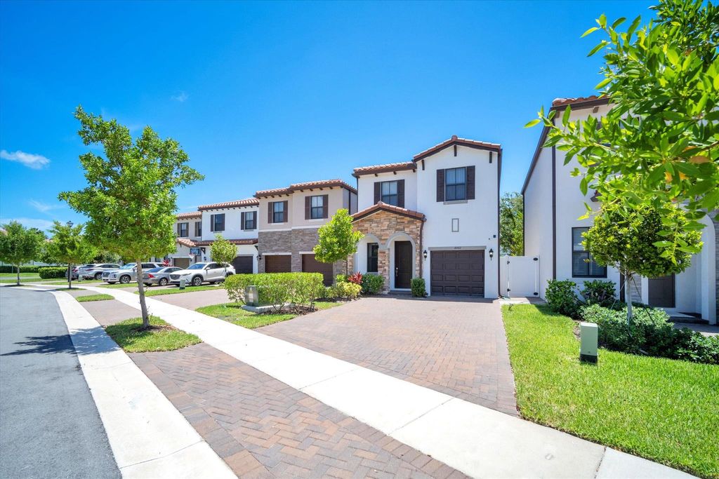 Photo of 4002 Sequoia Place W, Riviera Beach, FL 33410 (MLS # R10930440)