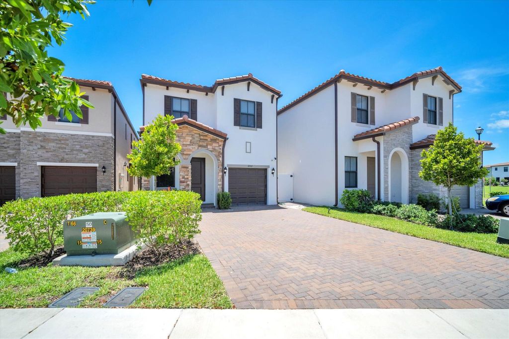 Photo of 4002 Sequoia Place W, Riviera Beach, FL 33410 (MLS # R10930440)