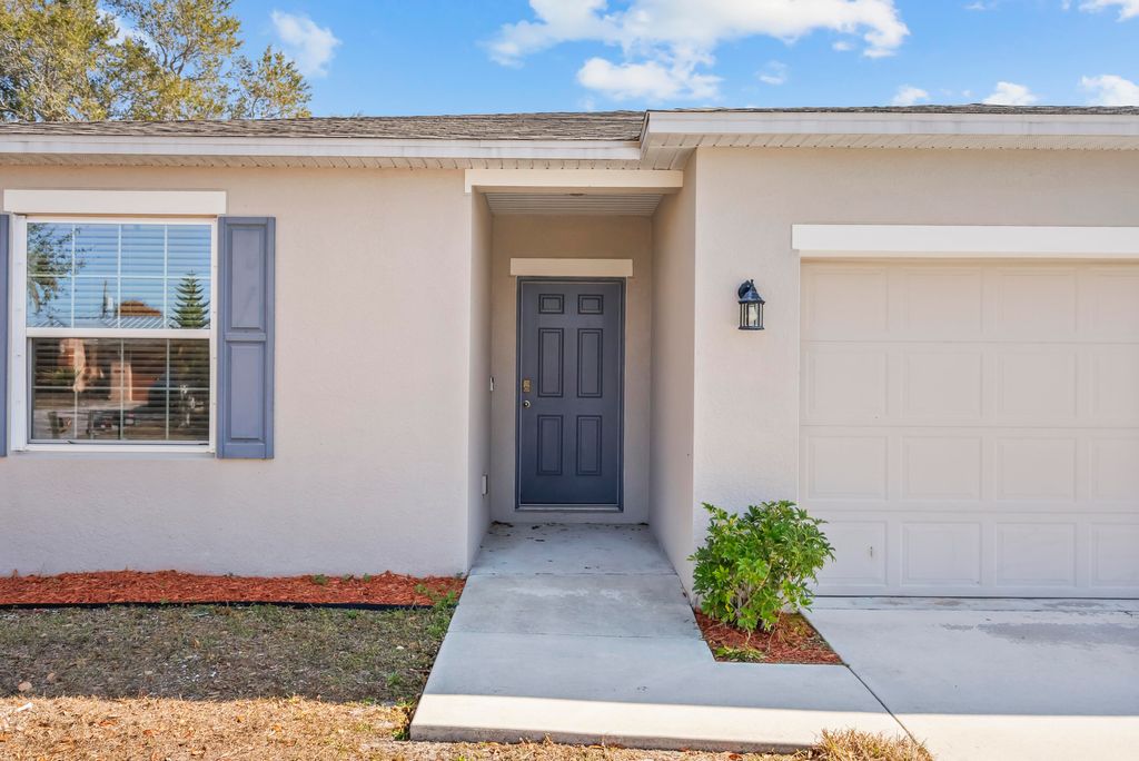 Photo of 2037 SW Mcallister Lane, Port Saint Lucie, FL 34953 (MLS # R11167876)