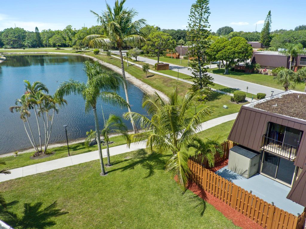 Photo of 6558 SE Windsong Lane, Stuart, FL 34997 (MLS # R11088900)