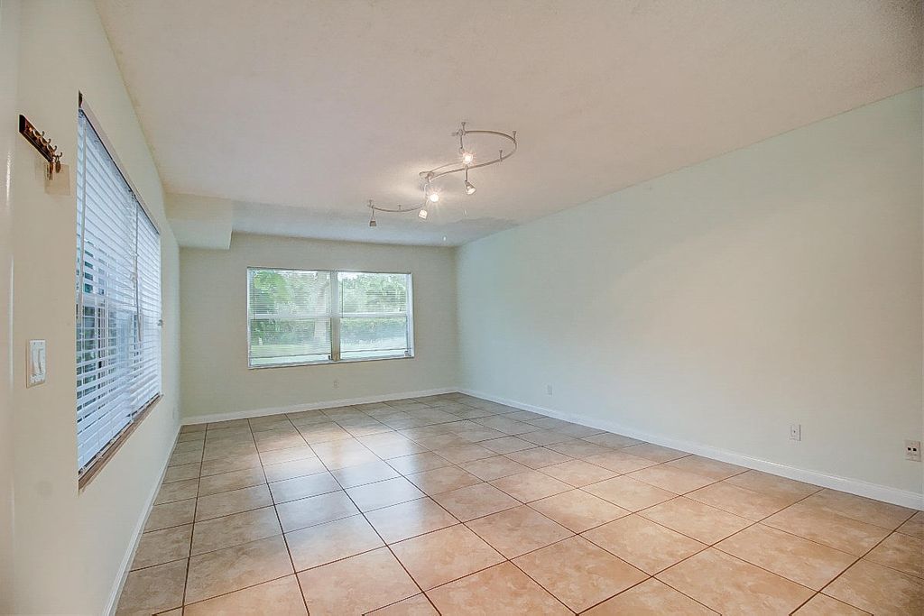 Photo of 44 Essex Court #B, West Palm Beach, FL 33411 (MLS # R11164967)