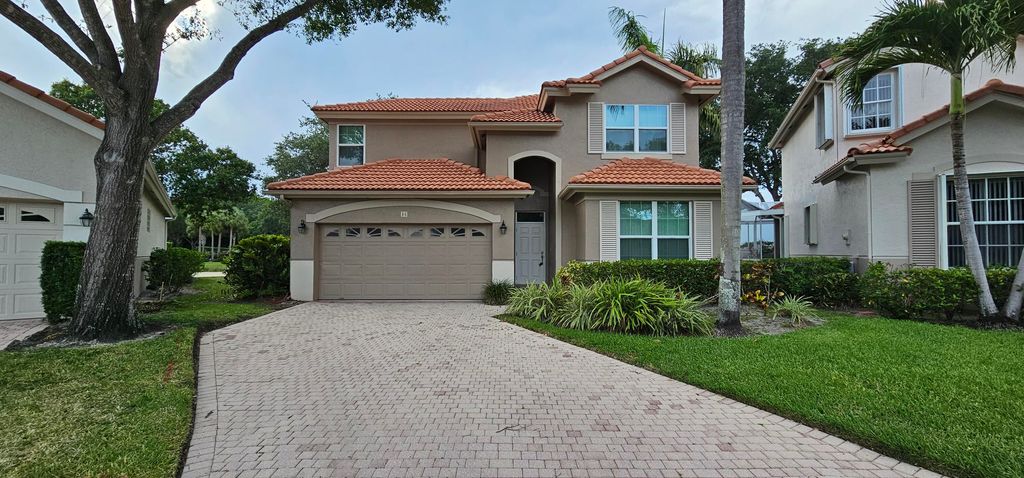Photo of 46 Pinnacle Cove, Palm Beach Gardens, FL 33418 (MLS # B26030037)