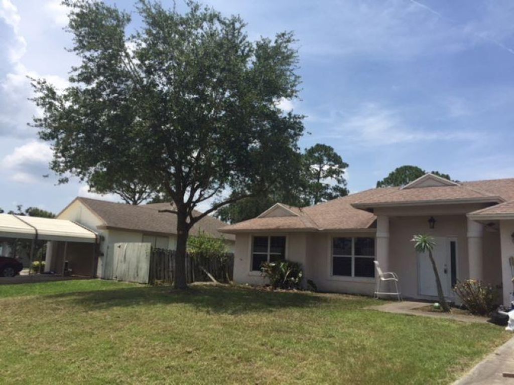 Photo of 1331 SW Sudder Ave, Port St Lucie, FL 34953 (MLS # F10385580)