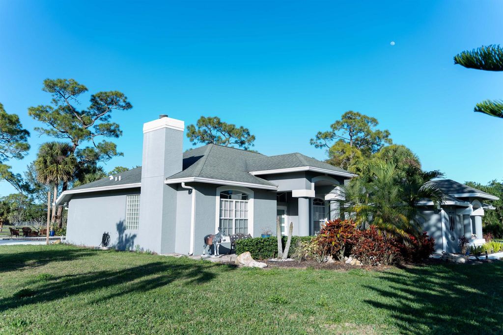 Photo of 14279 43rd Road, Loxahatchee Groves, FL 33470 (MLS # R11135110)