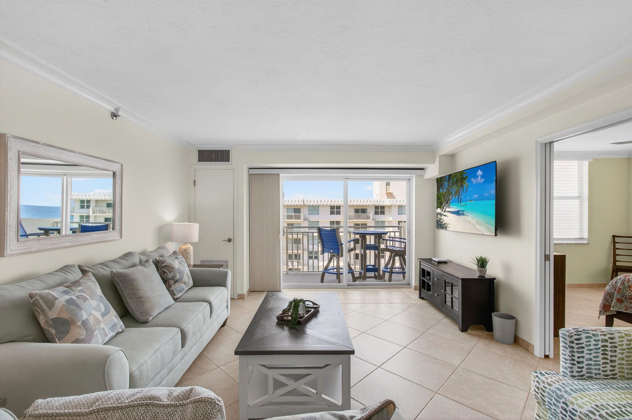 Furnished turnkey Penthouse condo ready for a quick move in! Be the 1st to enjoy the brand new furniture! Completely tiled--this split floor plan has 2 en-suite bedrooms with a walk-in closet in each. Dine alfresco on the direct north exposure open covered balcony! Enjoy ocean, intracoastal, pool, and city views! This annual furnished rental is available right away at $4,750/month. There are 3 mounted TVs, 3 lighted ceiling fans, a washer, a dryer, filtered water, and more! Water, sewer, trash removal, cable, and internet are included. Enjoy an assigned garage space & storage unit too! Steps to the elevator & trash chute. Have greater peace of mind with the 24 hours guard gated community entrance & secured building front door. A multiple year annual lease is possible. Exceptional value!