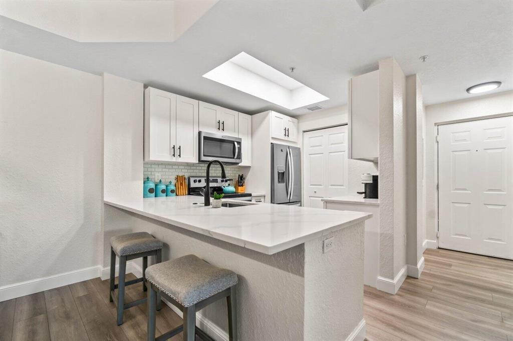 Photo of 2812 GRANDE Parkway #201, Palm Beach Gardens, FL 33410 (MLS # B26081451)
