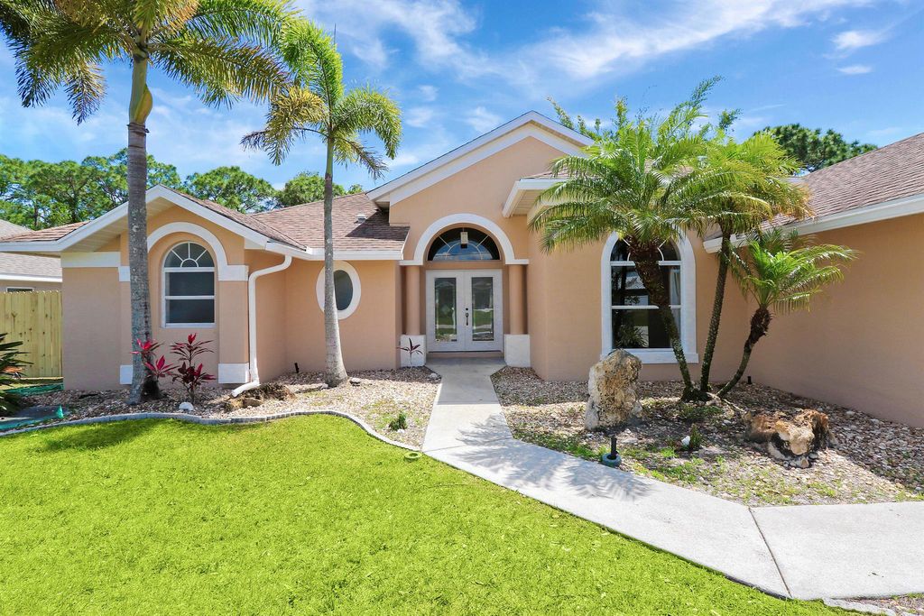 Photo of 6171 NW East Deville Circle, Port Saint Lucie, FL 34986 (MLS # R10975143)