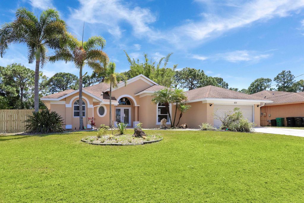 Photo of 6171 NW East Deville Circle, Port Saint Lucie, FL 34986 (MLS # R10975143)