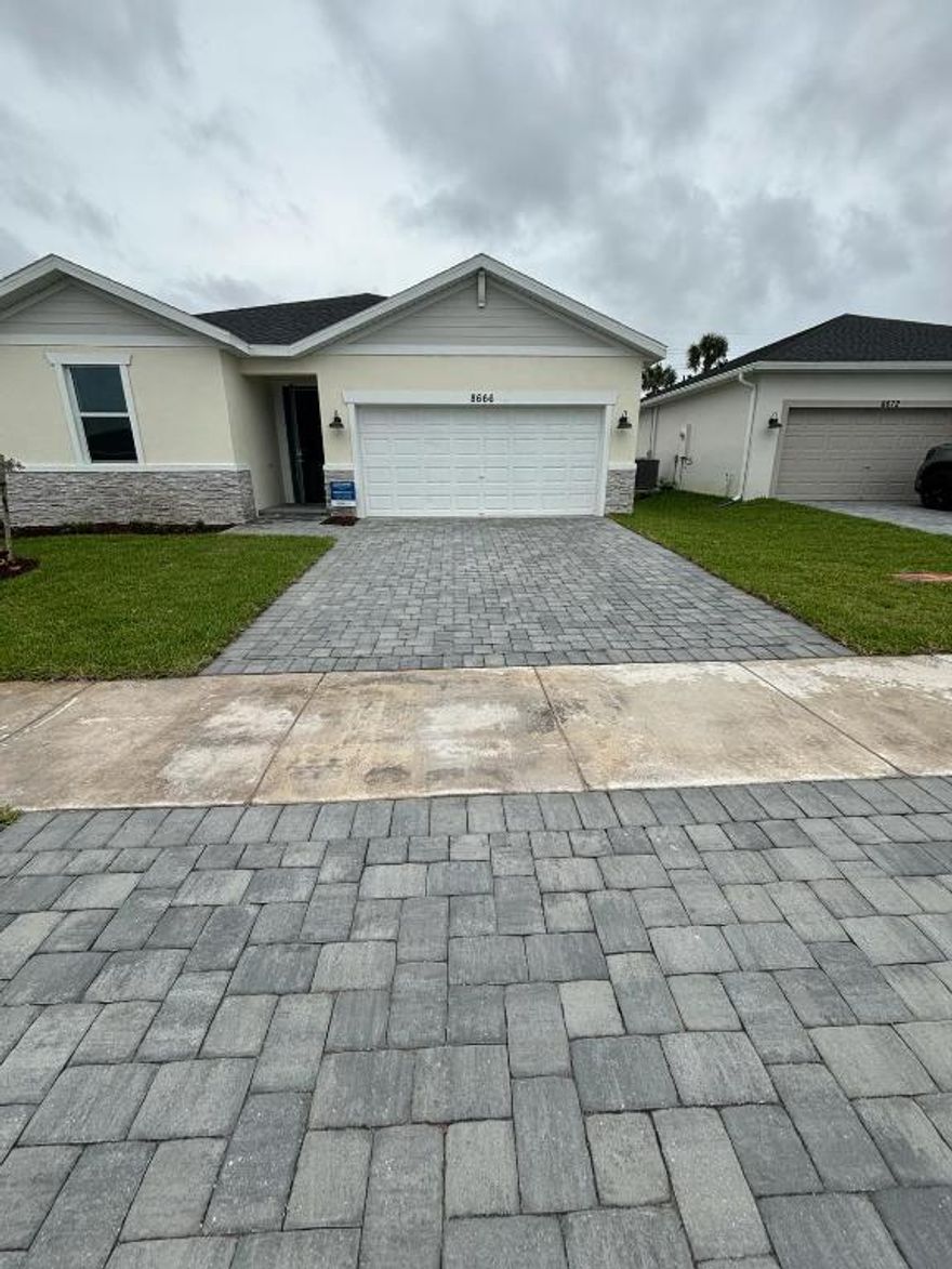 Featuring this brand new  construction 4 bedrooms 2 bath 2 car garage features include stainless steel appliances, granite counter tops , impact windows energy efficient home