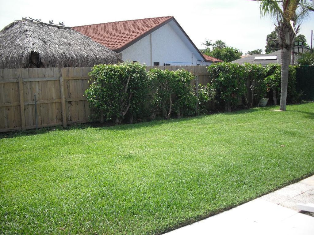 Photo of 453 W Conference Drive, Boca Raton, FL 33486 (MLS # R11101441)