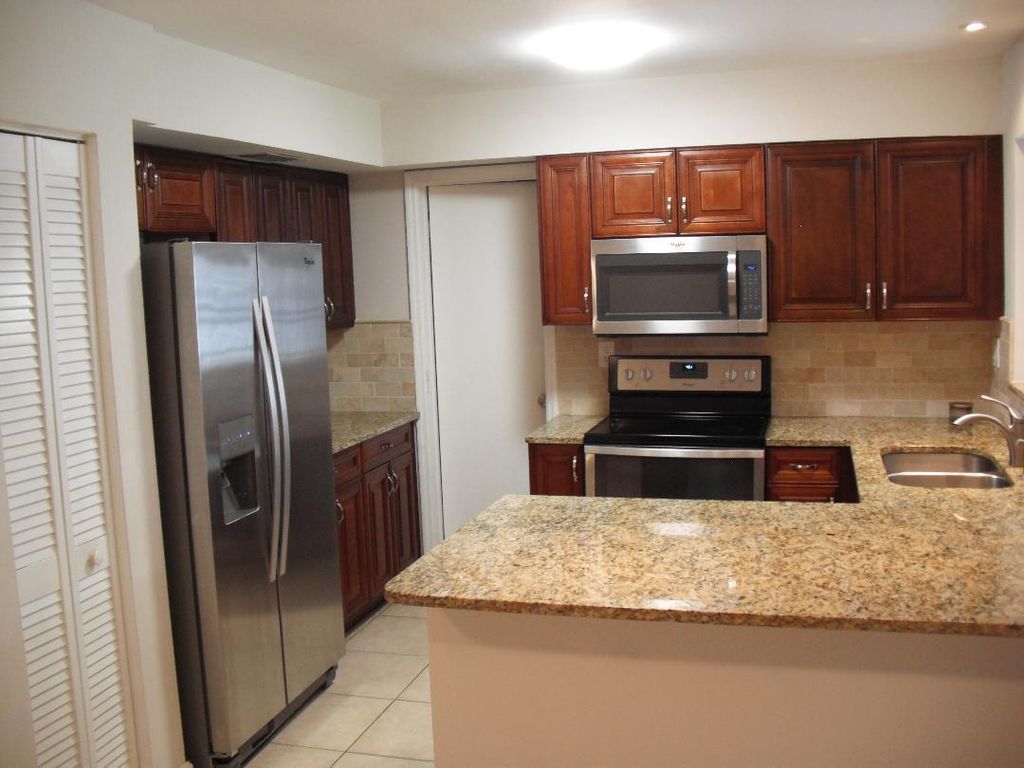 Photo of 453 W Conference Drive, Boca Raton, FL 33486 (MLS # R11101441)