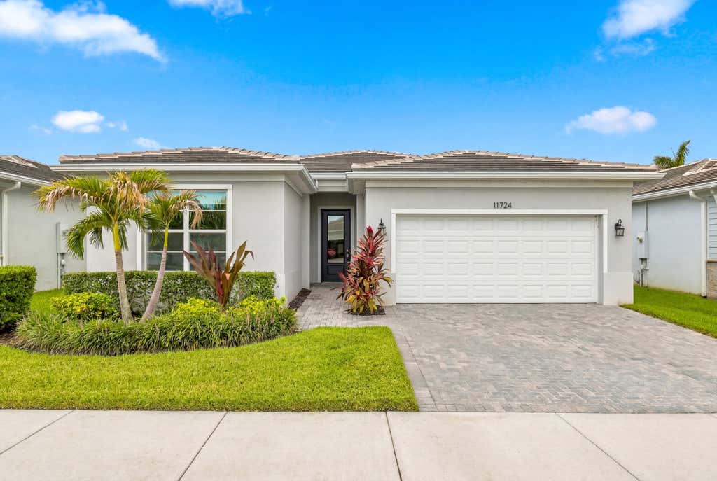 Photo of 11724 SW Aquila Way, Port Saint Lucie, FL 34987 (MLS # B26048401)