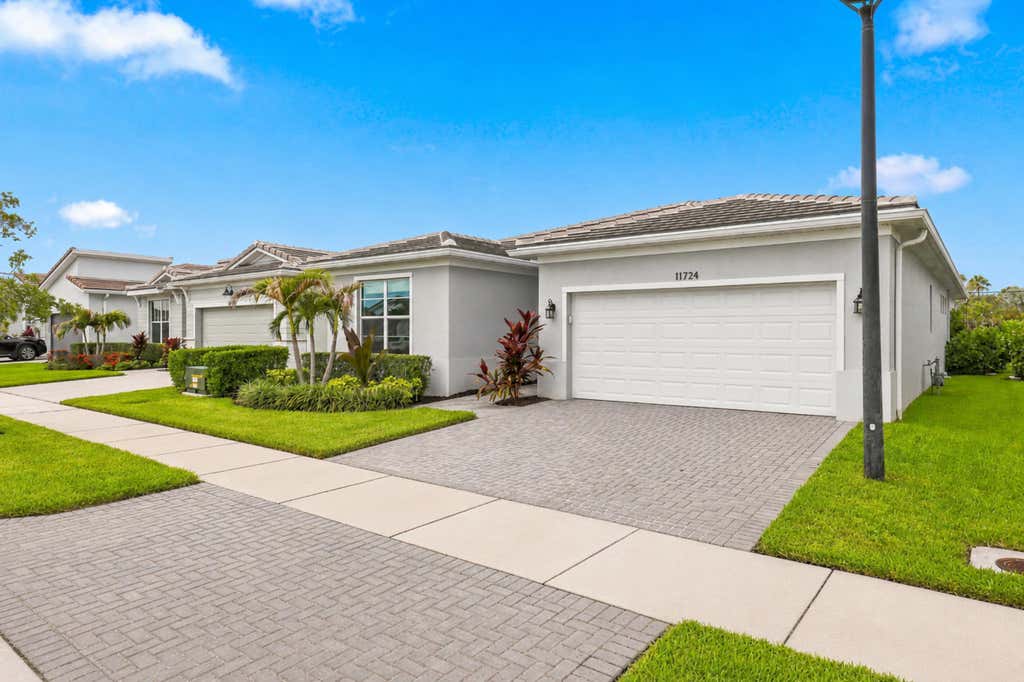 Photo of 11724 SW Aquila Way, Port Saint Lucie, FL 34987 (MLS # B26048401)