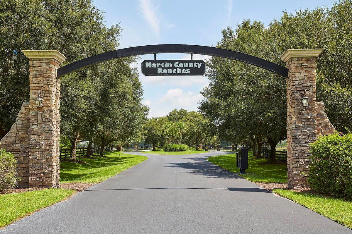 COME BUILD YOUR DREAM HOME ON THIS 20 ACRE HIGH & DRY PARCEL LOCATED IN THE ELEGANT SECURED - GATED EQUESTRIAN COMMUNITY OF MARTIN COUNTY RANCHES . MARTIN COUNTY RANCHES FEATURES GORGEOUS OAK - LINED ROADS AND STUNNING NATURAL VIEWS BOASTING 4.5 MILES OF BRIDAL TRAILS . THIS VERY UPSCALE HORSE AND / OR CATTLE RANCH COMMUNITY IS A HIDDEN GEM IN SOUTH FLORIDA! THIS IS YOUR OPPORTUNITY TO HAVE IT ALL. THERE IS ROOM FOR ALL YOUR RECREATIONAL NEEDS. BRING YOUR CAR COLLECTION , YOUR OFF ROAD TOYS AND YOUR HORSES ! UNDERGROUND UTILITIES AND FIBER OPTIC INTERNET IN PLACE. EASY ACCESS TO I-95 INTERSTATE & THE TURNPIKE . A 45 MINUTE DRIVE TO BEACH AND 1 HOUR TO PALM BEACH INTERNATIONAL​​‌​​​​‌​‌​​​‌‌​​​‌‌‌​​‌​​‌‌​​​​ AIRPORT.