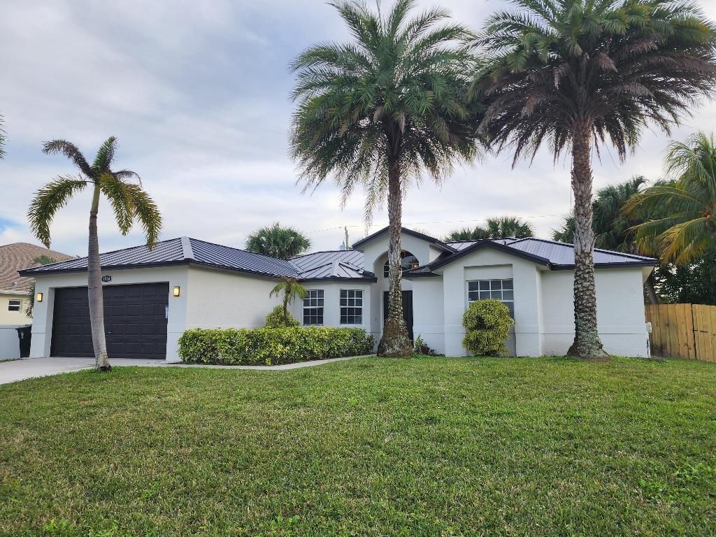 Photo of 1516 SW Escobar Lane, Port Saint Lucie, FL 34953 (MLS # R11157950)