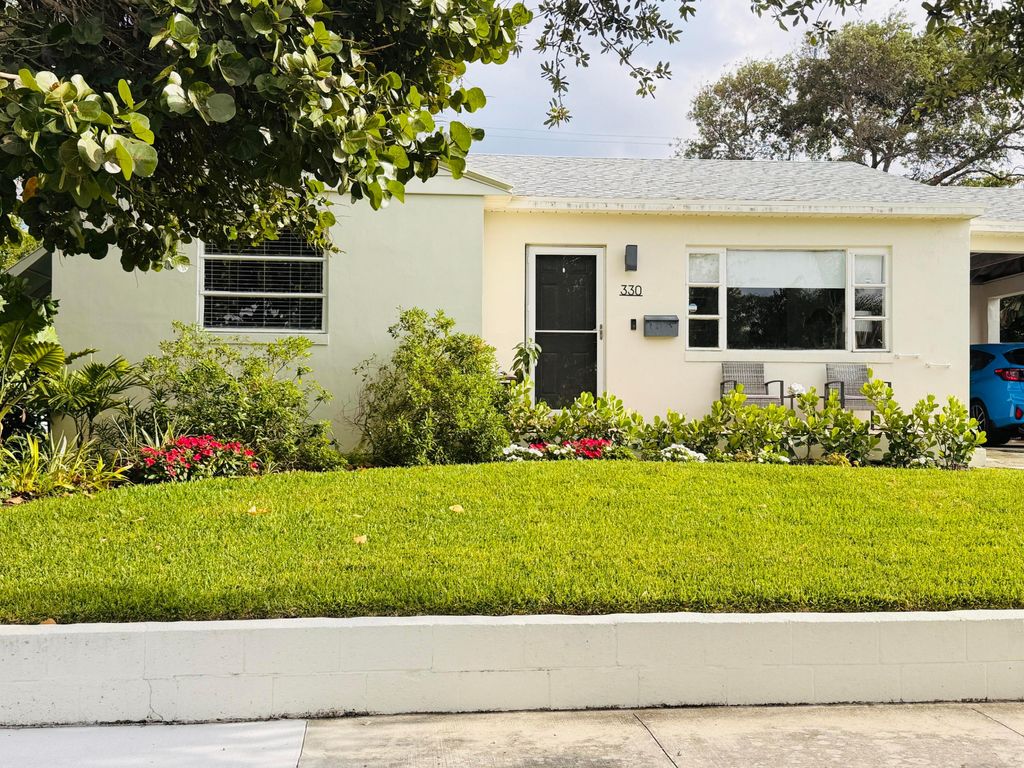 Photo of 330 Nathan Hale Road, West Palm Beach, FL 33405 (MLS # B26019078)