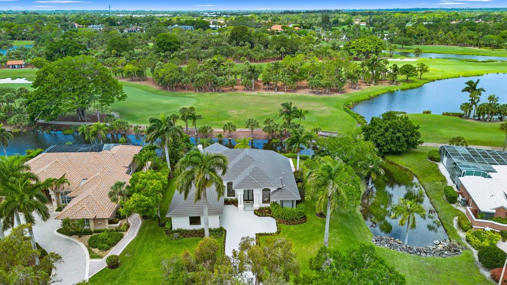 Photo of 1330 Breakers West Boulevard, West Palm Beach, FL 33411 (MLS # B26015025)