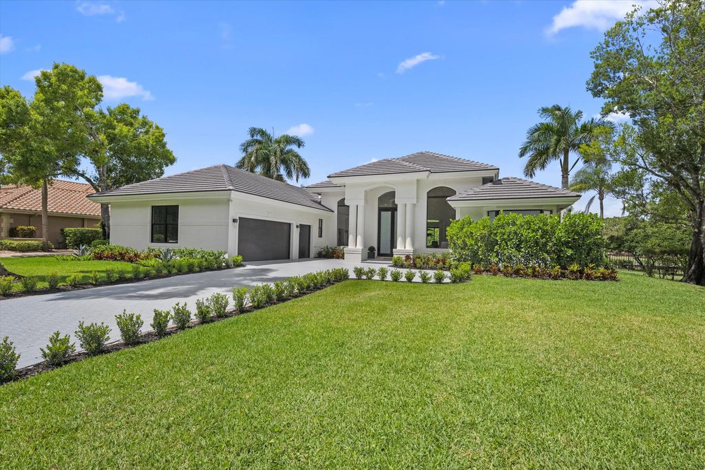 Photo of 1330 Breakers West Boulevard, West Palm Beach, FL 33411 (MLS # B26015025)