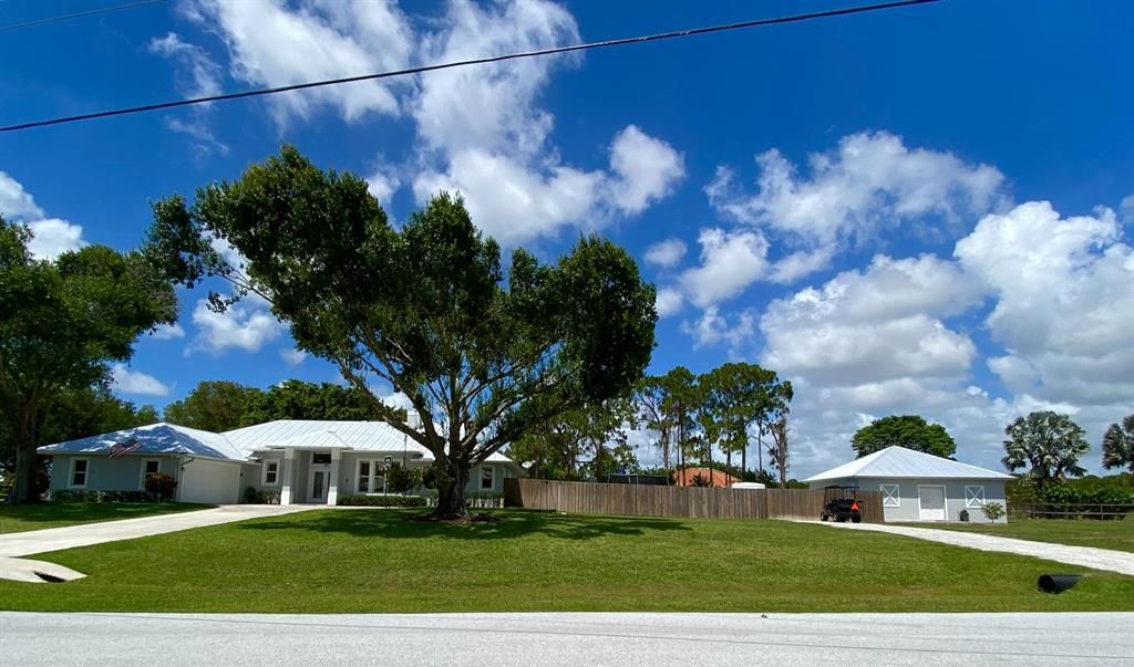 Photo of 9807 SW Pueblo Terrace, Palm City, FL 34990 (MLS # R10717980)