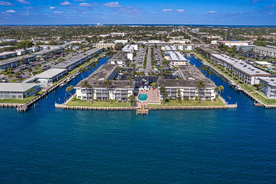 Lake Colony, a 55+ community, is located directly on the intracoastal waterway! There is a community pool and fishing pier. The community laundry room is free and included in the co-op dues along with water and basic cable.  There is also a larger storage space with the unit. This 2/1 condo sits right on the end of the hallway close to the laundry room and the elevator. Both bedrooms have a walk in closet. The bathroom has a tub/shower combo. The master has a screened balcony off the master bedroom that looks Northeast at the intracoastal. Live close to Juno/Jupiter and Singer Island beaches! Just down the street from North Palm Beach Country Club. Plenty of shopping at the Gardens Mall. Downtown Gardens has a Whole Foods and Lifetime. Hundreds of restaurants within a 5 mile radius!