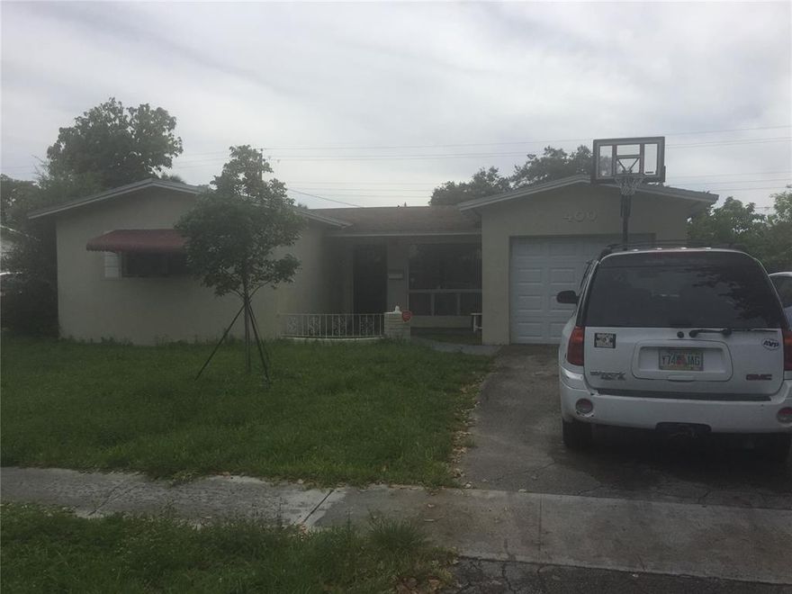 Lots of potential for this home in Pembroke Pines. Home "needs TLC" and  roof leaks so cash only.