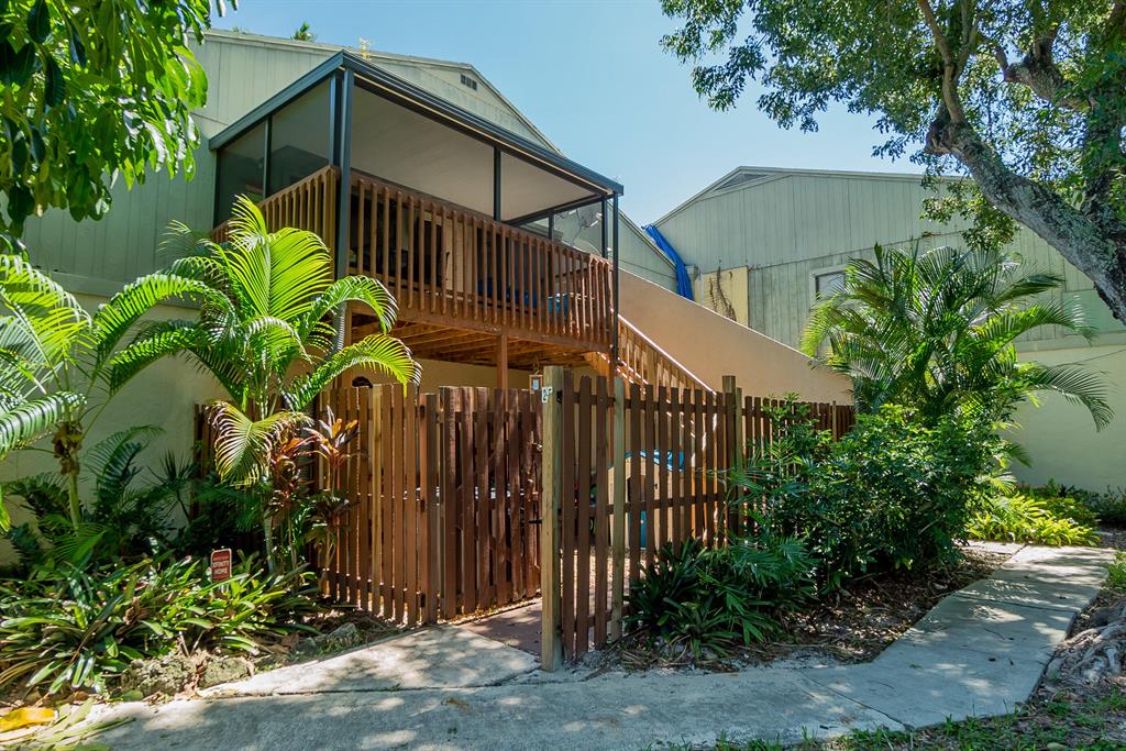 Great Investment! Rent immediately! Beautiful 2 bedroom, 1.5 bath unit situated on corner of building with lots of privacy. Split floor plan features large closets and very spacious rooms. Updated kitchen with SS appliances. Wood flooring. Oversized screened in balcony and patio are great for outdoor entertaining. The Crossings features a large community pool, playgrounds for children, tennis courts and clubhouse. Water is included.