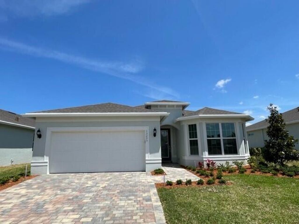 Photo of 13295 SW Calita Way, Port Saint Lucie, FL 34987 (MLS # R10943767)