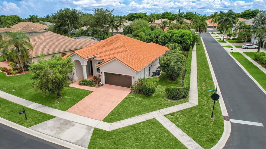 Welcome to this stunning home in the heart of West Boca Raton. This meticulously maintained residence underwent a full gut renovation completed in 2023, featuring modern, high-quality upgrades and thoughtful design. Located on a quiet corner lot, the home offers impact windows and doors, a split A/C in the garage, and an enclosed patio for seamless indoor-outdoor living. The upgraded kitchen includes a double sink, ideal for households with dietary restrictions. Step outside to a tropical oasis with fruit trees. Just a short walk to places of worship, this gated community offers lush landscaping and top-tier amenities—clubhouse, heated pool, playground, recreation areas, tennis, pickleball, basketball courts.
