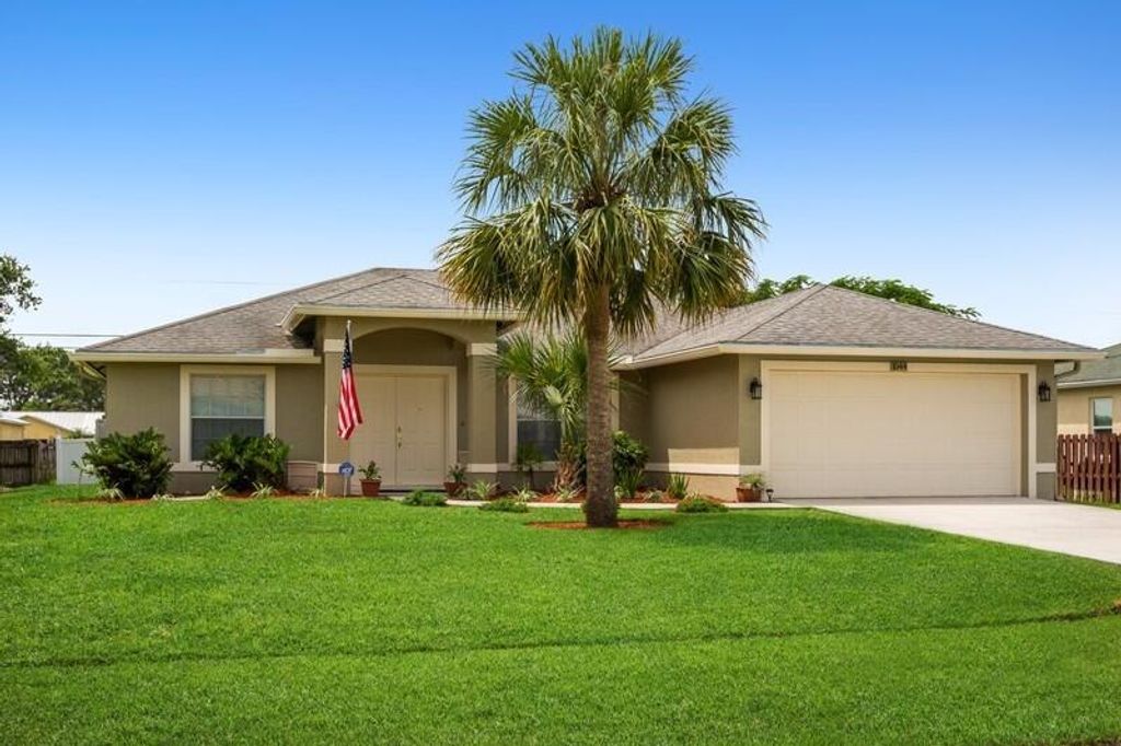 Photo of 1044 SW Firestone Avenue, Port Saint Lucie, FL 34953 (MLS # R10743047)