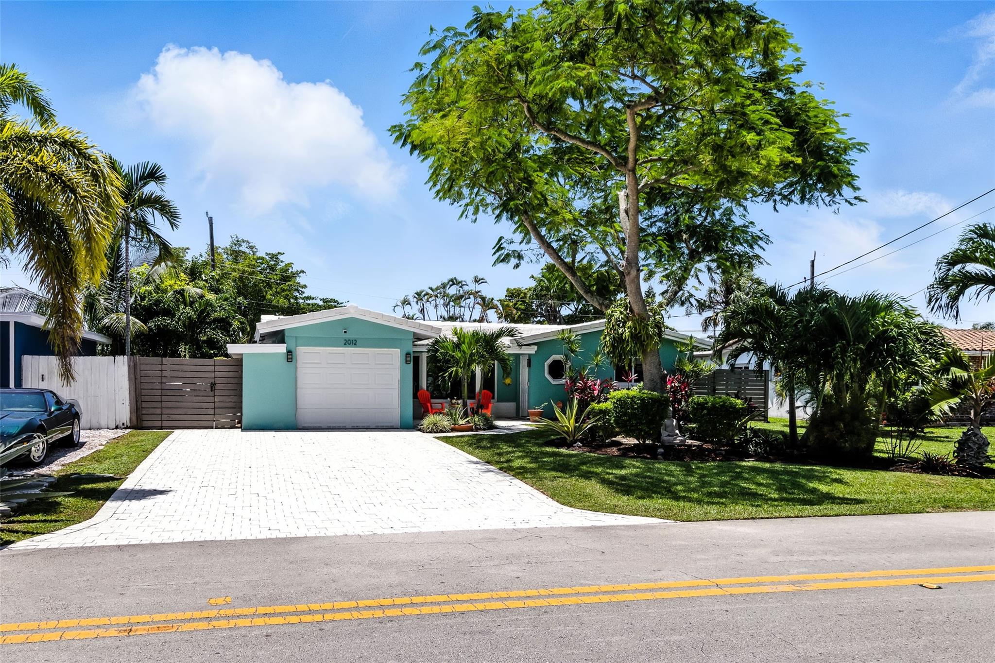Discover this beautifully upgraded 2BD/2BA home in one of Oakland Park’s best-kept-secrets —Royal Palm Acres. A lush, tranquil neighborhood just 3 miles from the beach. This home features luxury vinyl floors that flows throughout the bright, open layout. (2025), impact windows/sliding doors allows natural light to flood the interior (2019), a remodeled kitchen with quartz counters and S/S appliances (2020), a concrete tile roof (2021), updated A/C and ducts (2024), and a new electric panel (2024). Park your car in the oversized paved driveway. Take serene walks to the nearby lake, Easterlin Park, or dog park. Close to shops, dining, and more—this move-in-ready home offers comfort and style. Don’t miss your chance to live in this vibrant, welcoming community. Just move in and enjoy.