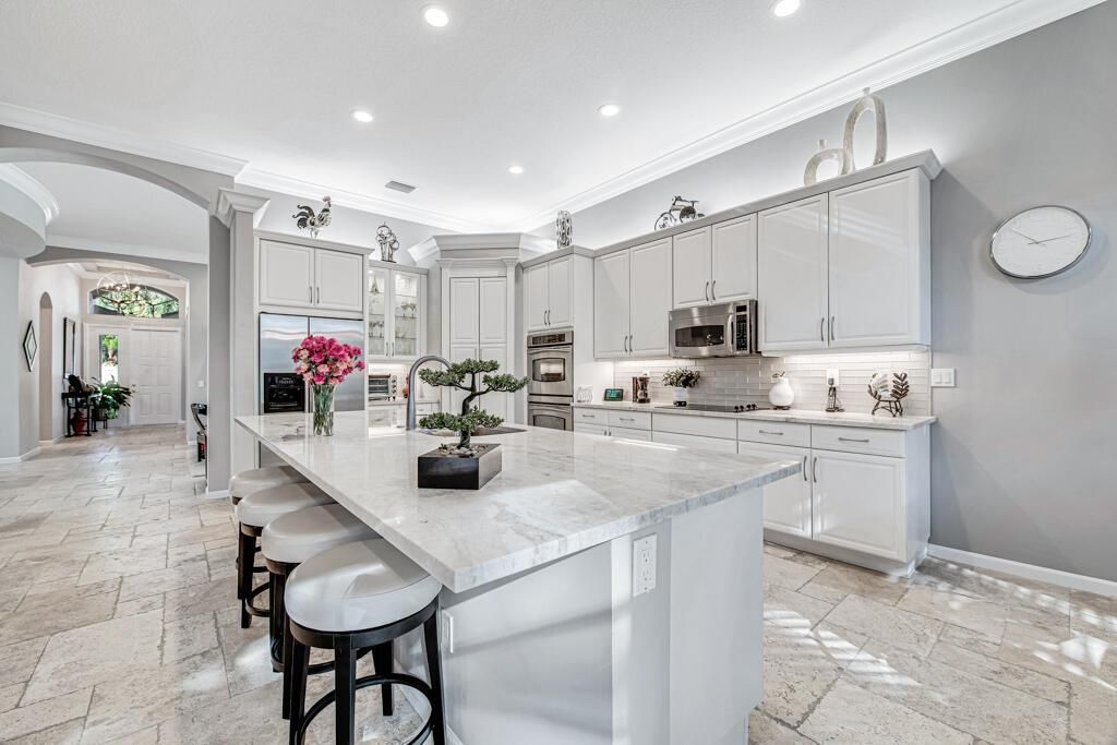 Photo of 7969 Oaklawn Cove, Lake Worth, FL 33467 (MLS # R11038666)