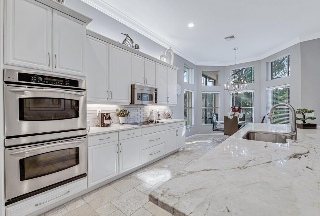 Photo of 7969 Oaklawn Cove, Lake Worth, FL 33467 (MLS # R11038666)