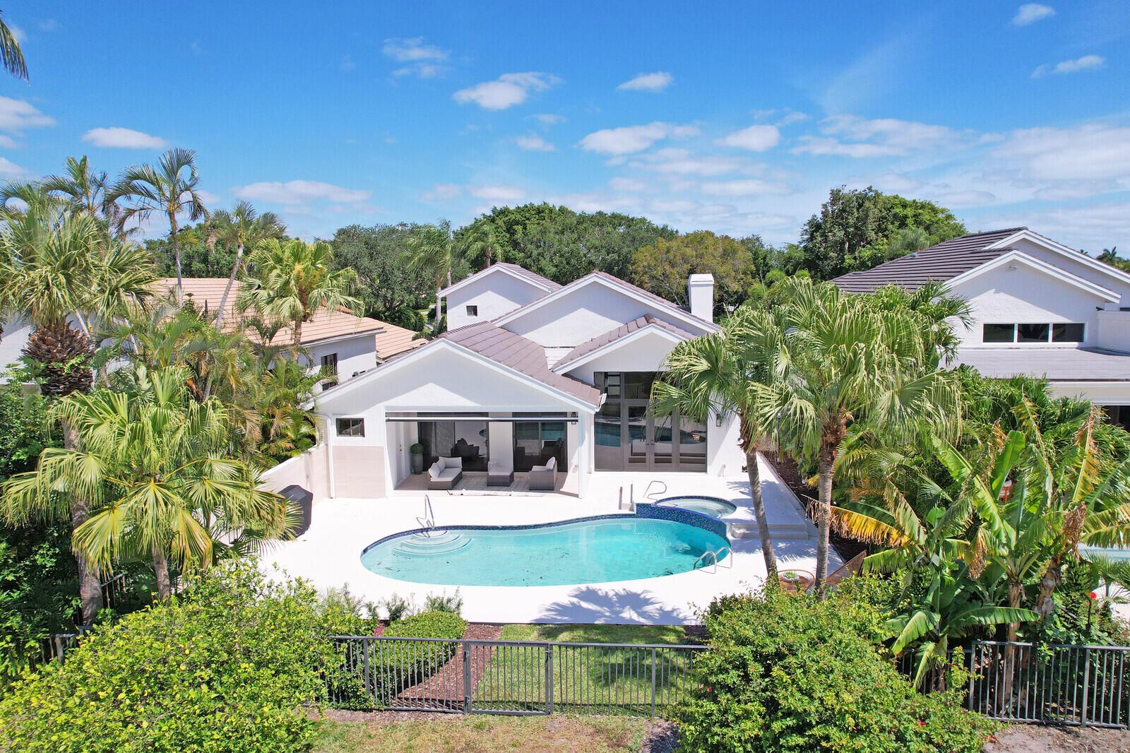 Discover luxury living in this completely renovated gem nestled within the prestigious Frenchman's Creek community. This exquisite 3-bedroom, 4.1-bathroom residence spans 2,996 square feet and boasts stunning golf course views. The home features a brand-new roof, all-new impact glass, and gleaming new floors throughout. The primary suite, conveniently located on the first floor, offers his-and-her baths for ultimate comfort and privacy. Step outside to your private oasis, complete with a beautiful pool and spa, complemented by a new pool deck and remote-controlled patio screens for effortless outdoor living. Don't miss this opportunity to own a meticulously updated home in one of Palm Beach Gardens' most sought-after communities!
