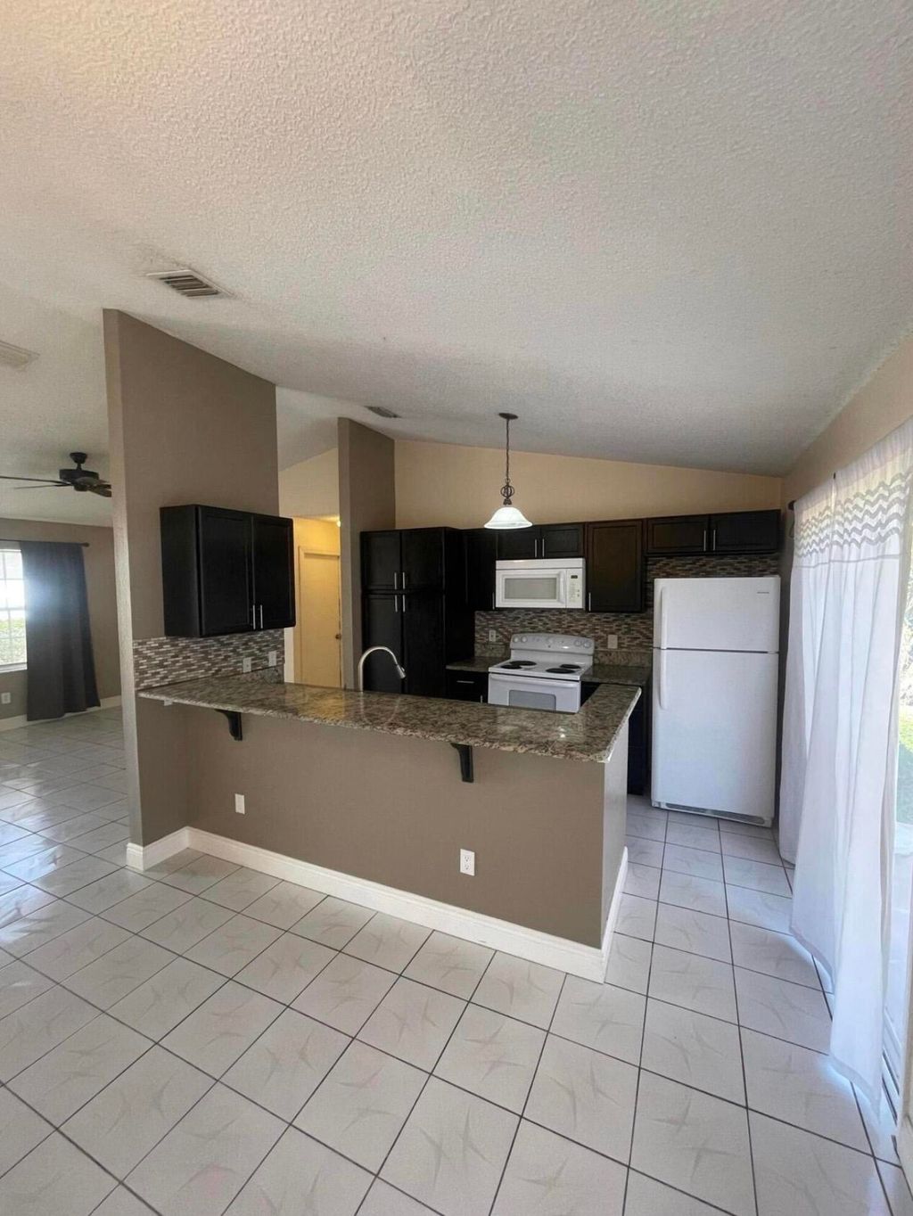 Photo of 1401 SE Appamattox Terrace, Port Saint Lucie, FL 34952 (MLS # B26000332)