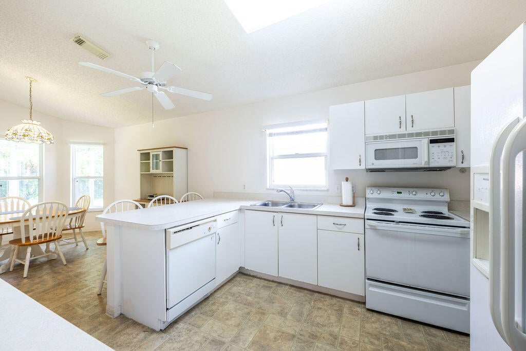 Photo of 619 Ponytail Lane, Fort Pierce, FL 34982 (MLS # R11015526)