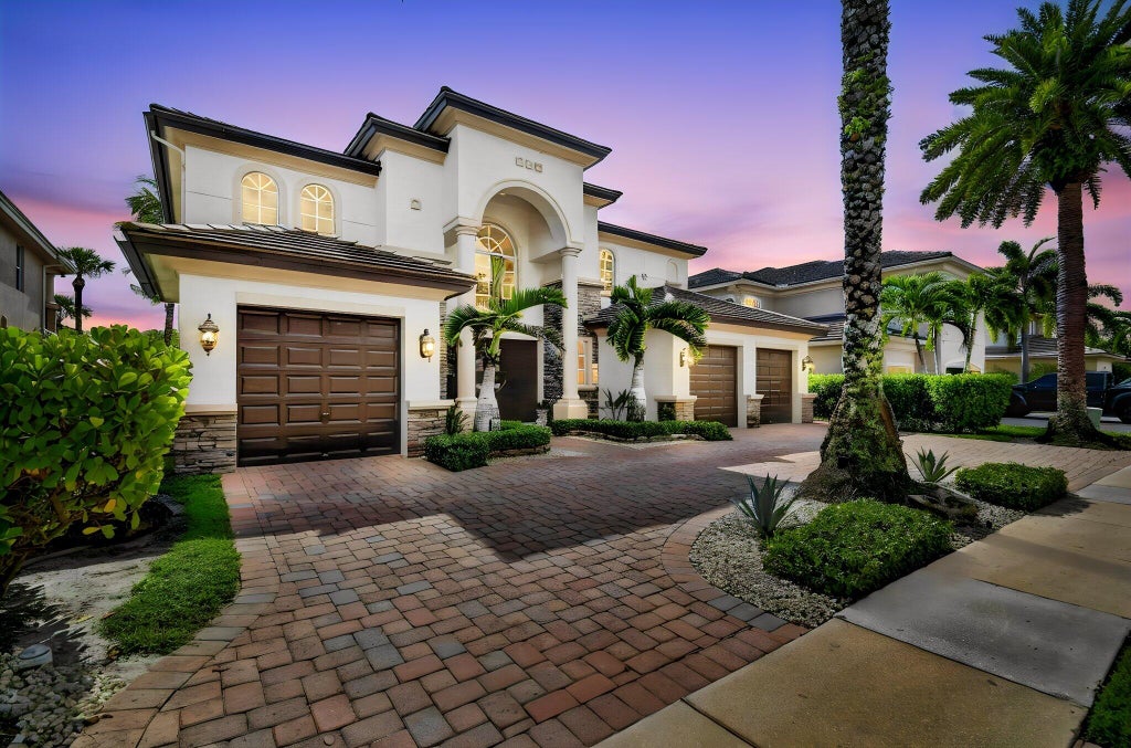 Photo of 718 Edgebrook Lane, West Palm Beach, FL 33411 (MLS # B26070848)
