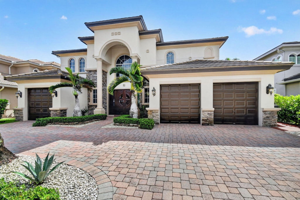 Photo of 718 Edgebrook Lane, West Palm Beach, FL 33411 (MLS # B26070848)
