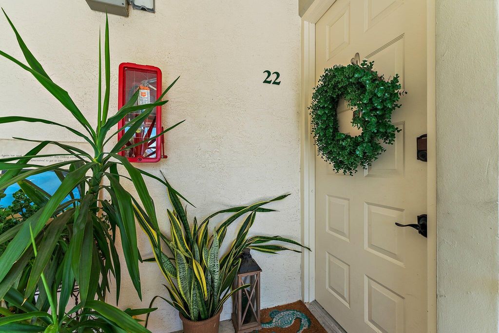 Photo of 4736 Chancellor Drive #22, Jupiter, FL 33458 (MLS # R11001808)