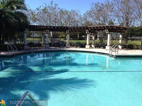 Photo of 4163 N HAVERHILL Road #1203, West Palm Beach, FL 33417 (MLS # B26067068)