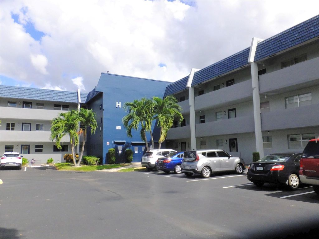 Photo of 7807 Golf Circle Drive #306, Margate, FL 33063 (MLS # B26019837)