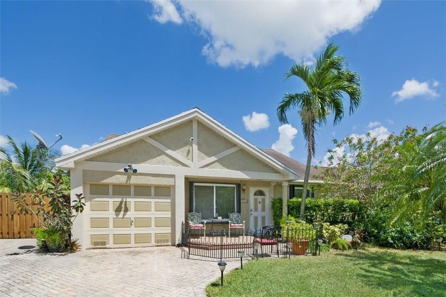 Just over 1/4 acre of outdoor living features multiple covered, screened & open patios to suit the occasion--with hot tub, fire pit, waterside dock, treehouse & fruit trees galore! Plus boat/RV pad. Nestled away in quiet neighborhood, this lovingly-maintained home boasts a custom-designed, large, eat-in kitchen w/granite counters, gas range, electric oven. Open floor plan flows from kitchen to living to formal dining. Solar hot water heater, soundproof windows & new A/C. Easy access to I-75 & I-595.