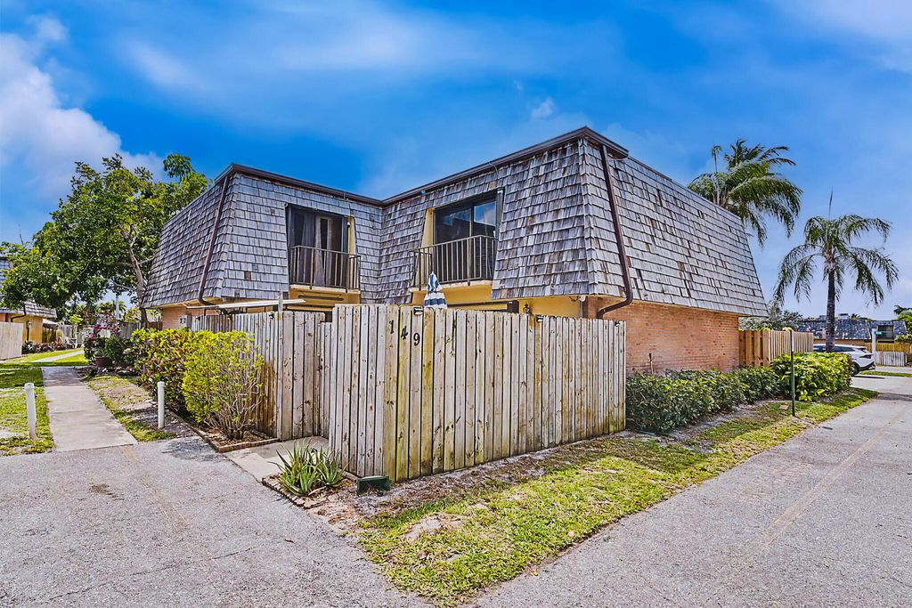 Photo of 149 Lake Arbor Drive, Palm Springs, FL 33461 (MLS # B26010068)