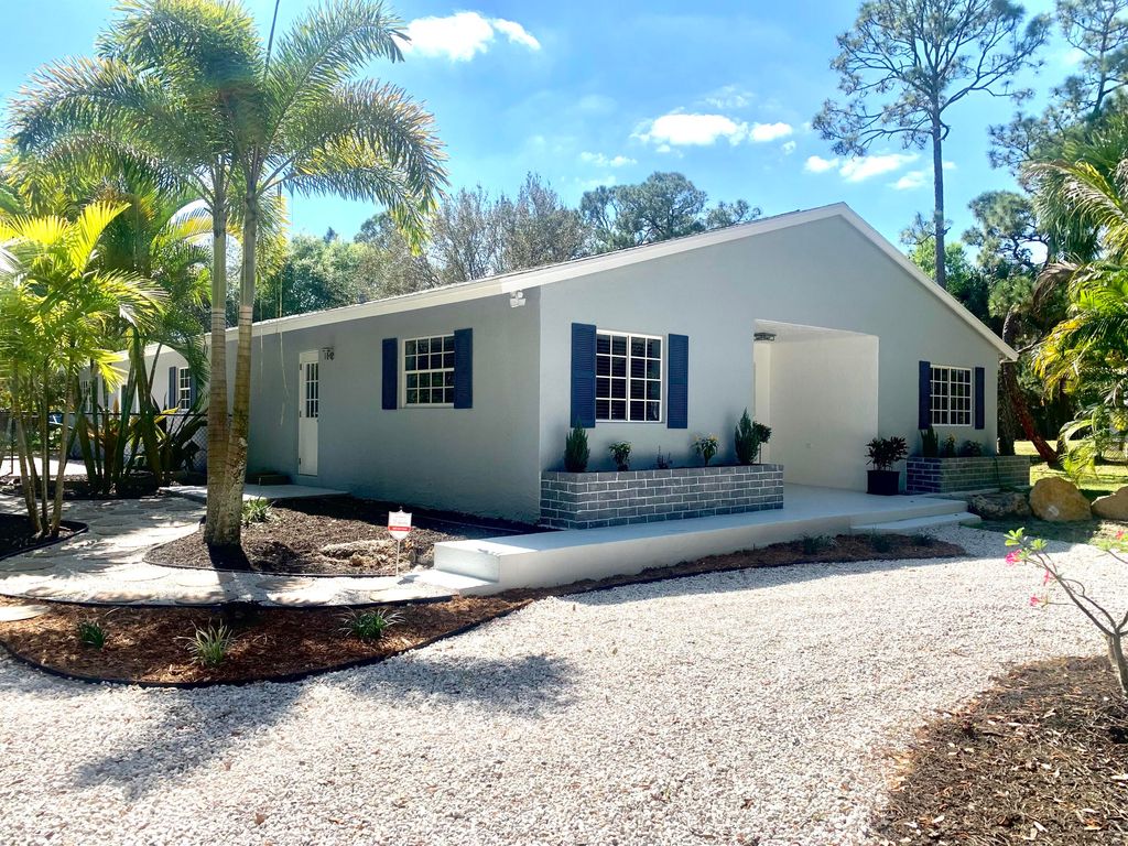 Photo of 15590 N 97th Road N, The Acreage, FL 33412 (MLS # R10868309)