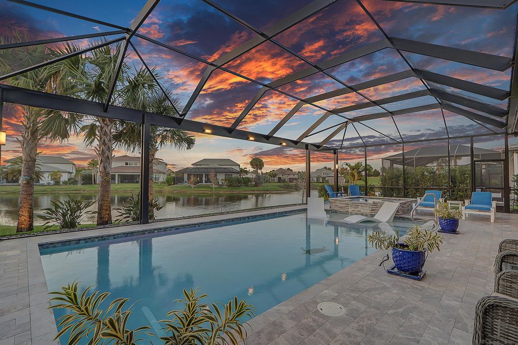 Photo of 117 Echelon Crest Trail, Jupiter, FL 33478 (MLS # R10973245)