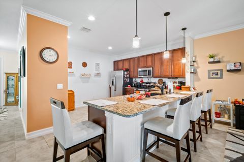 Photo of 6244 NW Helmsdale Way, Port Saint Lucie, FL 34983 (MLS # R11132344)