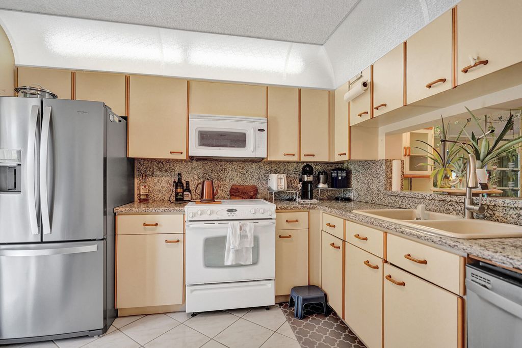 Photo of 5201 W Club Circle #103, Boca Raton, FL 33431 (MLS # B26045677)
