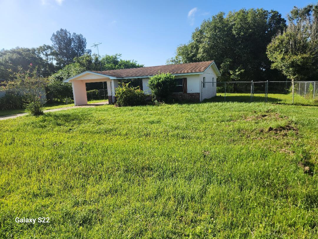 property located just a few blocks from Okeechobee main street. this 2/1 home located on a .321 acre. Buyers will need to address some repairs as for flooring , paint inside and out...needs appliances Charles Holmes Coldwell Banker for showings... there are no appliances included in sell of home... this home is offered at as is condition